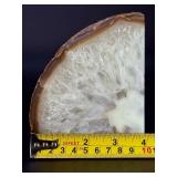 Agate Quartz with Slight Rainbows is a captivating natural stone that blends the grounding beauty of agate with the clarity and light play of quartz.