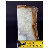 Agate Quartz with Slight Rainbows is a captivating natural stone that blends the grounding beauty of agate with the clarity and light play of quartz.