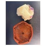 Amethyst Geode with Calcite is a stunning natural formation that combines sparkling amethyst crystals with contrasting calcite inclusions.