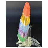 Moon-Shaped Crystal with Red Jasper, Tiger Eye, Sodalite, Charoite, Aventurine, Howlite & Amethyst is a vibrant, multi-stone piece carved into a graceful crescent moon.