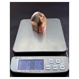 Super 7 Tower is a powerful and highly sought-after crystal carved into a polished towerthat showcases the natural blend of seven minerals: amethyst, clear quartz, smokyquartz, rutile, goethite, lepid