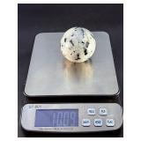 Rainbow Moonstone Sphere is a luminous and enchanting crystal sphere known for its soft glow and mesmerizing flashes of blue, rainbow, and pearly light that shimmer as it moves.