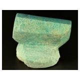 Amazonite Hand-Carved Chunk is a beautifully sculpted crystal piece that highlights the soothing blue-green tones and natural striations of amazonite.