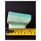 Amazonite Hand-Carved Chunk is a beautifully sculpted crystal piece that highlights the soothing blue-green tones and natural striations of amazonite.