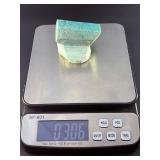 Amazonite Hand-Carved Chunk is a beautifully sculpted crystal piece that highlights the soothing blue-green tones and natural striations of amazonite.