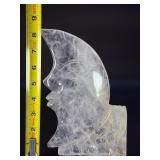 Hand-Carved Moon with Rose is a beautifully detailed crystal carving that blends celestial symbolism with gentle, heart-centered beauty. Shaped into a graceful crescent moon and adorned with a delicat
