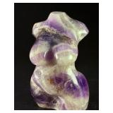 Divine Feminine Amethyst Chevron is a beautifully patterned crystal that combines the deep purple of amethyst with milky white quartz in distinctive V-shaped chevron banding.