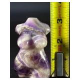 Divine Feminine Amethyst Chevron is a beautifully patterned crystal that combines the deep purple of amethyst with milky white quartz in distinctive V-shaped chevron banding.