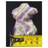 Divine Feminine Amethyst Chevron is a beautifully patterned crystal that combines the deep purple of amethyst with milky white quartz in distinctive V-shaped chevron banding.