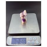 Divine Feminine Amethyst Chevron is a beautifully patterned crystal that combines the deep purple of amethyst with milky white quartz in distinctive V-shaped chevron banding.