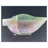 Fluorite Leaf Dish is a hand-carved crystal piece shaped like a delicate leaf bowl, showcasing the natural banding and vibrant colors of fluorite.