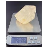 Quartz Point - Golden Healer is a striking crystal featuring clear quartz accented with subtle golden tones from natural iron inclusions, known as Golden Healer.