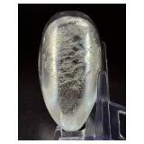 Natural Clear Quartz Puffy Heart with inclusions is a charming, hand-polished crystal carved into a soft, rounded heart shape.