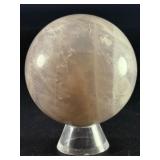 Blue Quartz Sphere is a polished crystal sphere that showcases the calming, ethereal beauty of blue quartz.