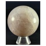 Blue Quartz Sphere is a polished crystal sphere that showcases the calming, ethereal beauty of blue quartz.