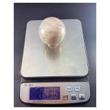 Blue Quartz Sphere is a polished crystal sphere that showcases the calming, ethereal beauty of blue quartz.