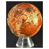 Sunstone and Blue Apatite Sphere is a striking crystal sphere that combines the warm, radiant energy of sunstone with the calming, deep blue tones of apatite.