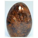 Brown Quartzite Freeform is a naturally shaped, polished stone that highlights the earthy, warm tones and subtle striations of quartzite.