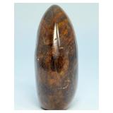 Brown Quartzite Freeform is a naturally shaped, polished stone that highlights the earthy, warm tones and subtle striations of quartzite.