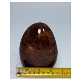 Brown Quartzite Freeform is a naturally shaped, polished stone that highlights the earthy, warm tones and subtle striations of quartzite.