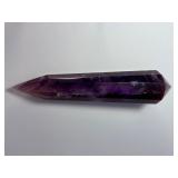 Extra Large Amethyst Vogel Double Terminated is a powerful and visually striking crystal, expertly carved into the iconic Vogel shape with pointed terminations at both ends.