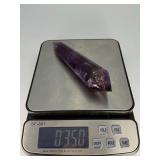 Extra Large Amethyst Vogel Double Terminated is a powerful and visually striking crystal, expertly carved into the iconic Vogel shape with pointed terminations at both ends.