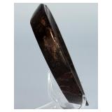 Arfvedsonite Heart Dish is a beautifully hand-carved crystal dish shaped like a heart, showcasing the deep, inky blue-black tones and striking natural patterns of arfvedsonite.