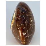 Orbs Ocean Jasper Palm Stone is a smooth, hand-polished crystal shaped to fit comfortably in the palm, showcasing the signature orb-like patterns and soothing earthy tones of ocean jasper.