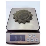 Golden Obsidian Sun is a striking crystal piece carved into a radiant sun shape, showcasing the deep black sheen of obsidian accented with shimmering golden flashes.