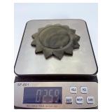 Golden Obsidian Sun is a striking crystal piece carved into a radiant sun shape, showcasing the deep black sheen of obsidian accented with shimmering golden flashes.