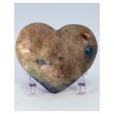 Azurite Malachite in Quartz Heart is a beautifully hand-carved crystal heart that combines the vibrant blue of azurite, the rich green of malachite, and the clear brilliance of quartz.