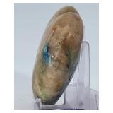 Azurite Malachite in Quartz Heart is a beautifully hand-carved crystal heart that combines the vibrant blue of azurite, the rich green of malachite, and the clear brilliance of quartz.