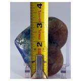 Azurite Malachite in Quartz Heart is a beautifully hand-carved crystal heart that combines the vibrant blue of azurite, the rich green of malachite, and the clear brilliance of quartz.