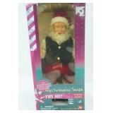 Gemmy Hip Swinging Santa Doll. North Pole Productions