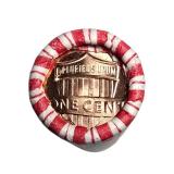 Three rolls of uncirculated pennies: one is 2024-D mint, and the other two are unknown (Shield out).