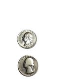 Silver quarters in good condition with various mint markings.