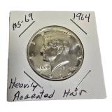 1964 John F. Kennedy Half Dollar, MS-69 grade, featuring the Heavy Accented Hair variant.