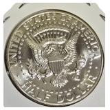 1964 John F. Kennedy Half Dollar, MS-69 grade, featuring the Heavy Accented Hair variant.