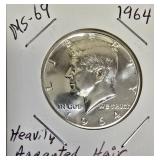 1964 John F. Kennedy Half Dollar, MS-69 grade, featuring the Heavy Accented Hair variant.