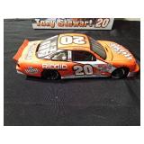 Action Tony Stewart #20 die cast Nascar race car bank with key. 1 of 3600