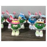 Lot of 17 Collectible Mini M&M Figurines (None of them have been opened - they still have candy and plastic wrapped around them)