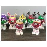 Lot of 17 Collectible Mini M&M Figurines (None of them have been opened - they still have candy and plastic wrapped around them)