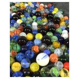 Lot of Collectible Marbles  - Some of them glow green when you put a black light on them