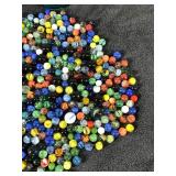 Lot of Collectible Marbles  - Some of them glow green when you put a black light on them