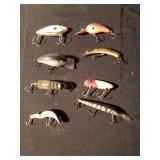 8 fishing lures including 1 wooden lure (See Details)