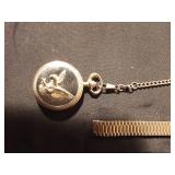 4 wrist watches and a pocket watch