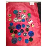 Lot of Pokemon trading coins and pins