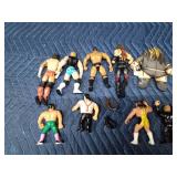 Vintage wrestling figurines and 2 toy wrestling belts