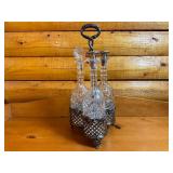 Antique Tantalus Set with Three Cut Glass Decanters and Silver-Plated Stand