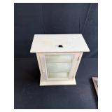 Small White Wall Cabinet and Framed Art Print